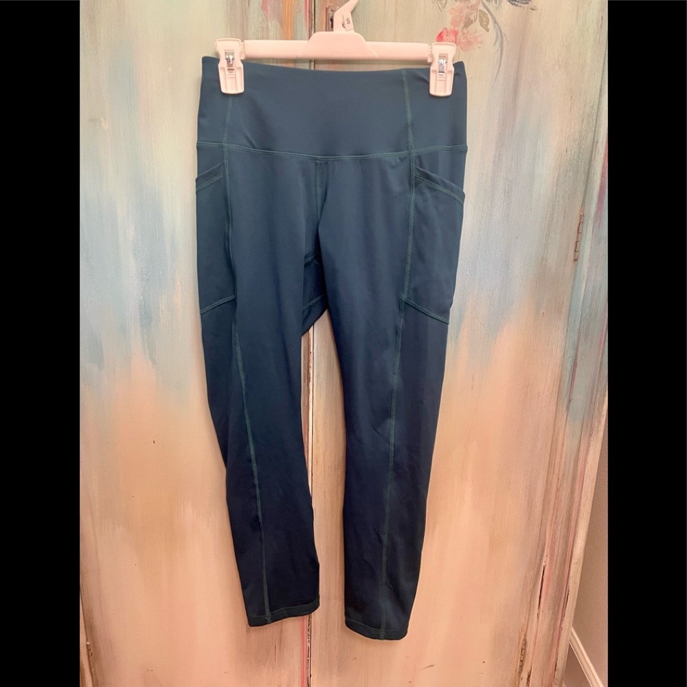 NWOT.  All in Motion Small capri work out leggings in a cool sea blue color.